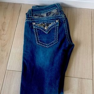 Miss Me distressed skinny jeans with lots of bling.size 28